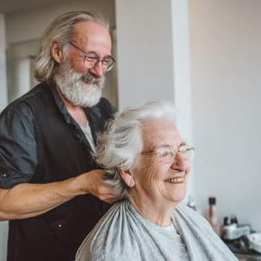 Resident Stylist delivering compassionate care to nursing home resident